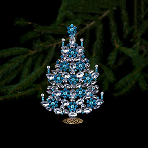 A csillogó karácsonyfa (Aqua), Csillogó táblázat felső karácsonyfa kézműves tiszta, kék flitterekkel díszített virágok, gyertyák,